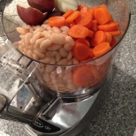 Add Cooked Potatoes, Beans and canned carrots to the food processor